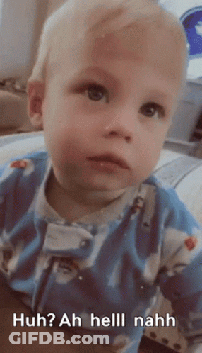 A Baby Is Wearing A Blue Outfit And Says Huh ? Ah Helll Nahh GIF
