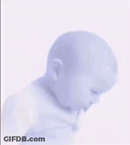 Baby Wearing Purple Shirt Making Sad Face GIF