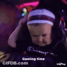 A Baby Is Wearing Headphones And A Headband And Says `` Gaming Time '' . GIF