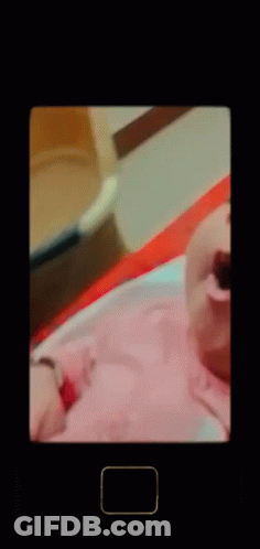 A Baby Is Yawning With A Square In The Corner GIF