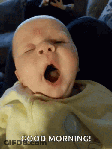 A Baby Is Yawning With The Words Good Morning Written In The Corner GIF