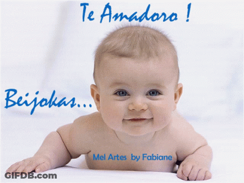 A Baby Laying On A Bed With The Words Te Amadora Beijokas GIF