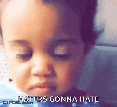 A Baby Making A Face With The Words Haters Gonna Hate Written Below It GIF