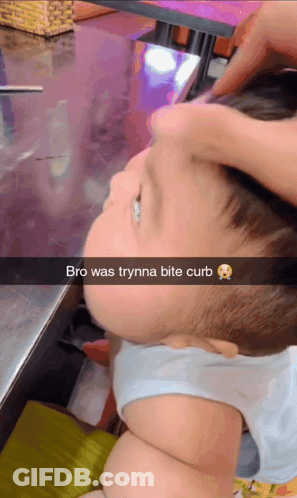 A Baby 'S Face Is Shown With A Caption That Says " Bro Was Trynna Bite Curb " GIF