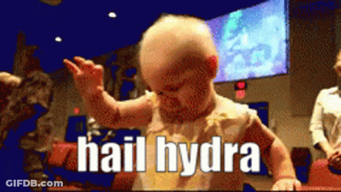 A Baby Says Hail Hydra In A Blurry Photo GIF