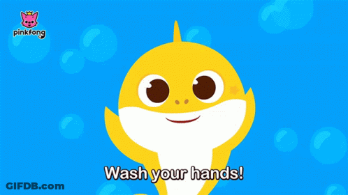 A Baby Shark Says " Wash Your Hands " In Front Of A Blue Background GIF