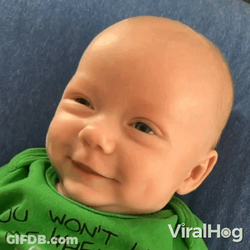 A Baby Wearing A Green Shirt That Says " You Won 'T Where " GIF