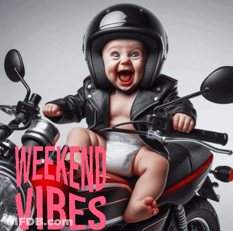 A Baby Wearing A Helmet Sits On A Motorcycle GIF