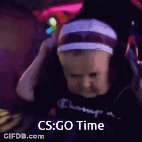 A Baby Wearing Headphones With The Words Cs Go Time Below Him GIF