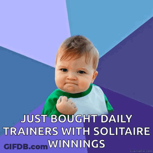 A Baby With A Fist In The Air With The Words Just Bought Daily Trainers With Solitaire Winnings GIF