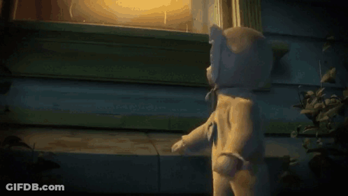 A Baby With A Pacifier Is Crawling Next To A Teddy Bear . GIF