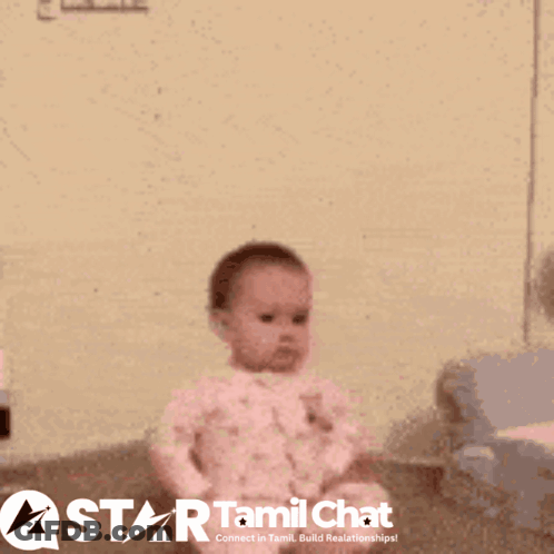 A Baby With A Star Tamil Chat Logo In The Corner GIF
