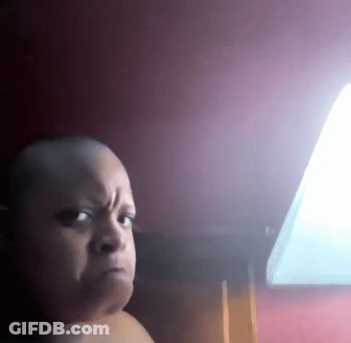 A Baby Without A Shirt Is Making A Funny Face GIF