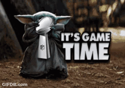 A Baby Yoda Holding A Super Bowl Trophy With The Words It 'S Game Time Behind Him GIF