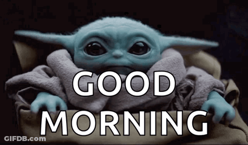 A Baby Yoda Is Wrapped In A Blanket And Says " Good Morning " GIF