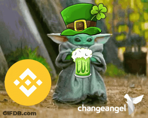 A Baby Yoda Wearing A Green Leprechaun Hat Holds A Beer In Front Of A Change Angel Logo GIF