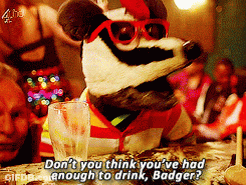 Badger Wearing Sunglasses Sitting At Table With Water GIF