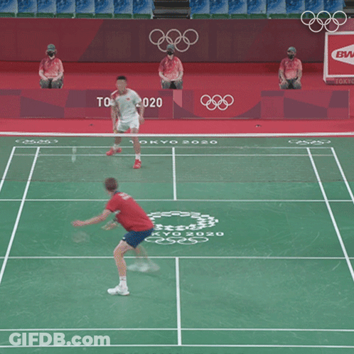 A Badminton Court With Tokyo 2020 On The Floor GIF