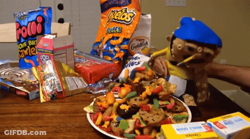 A Bag Of Cheetos Puffs Sits On A Table GIF