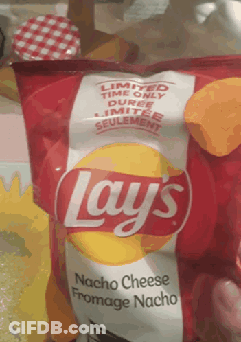 A Bag Of Lays Nacho Cheese Fromage Nacho Chips On A Table GIF