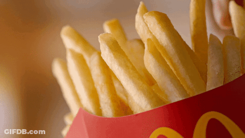 A Bag Of Mcdonald 'S French Fries In A Red And Yellow Box GIF