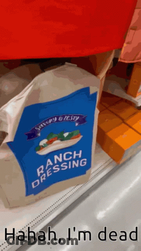 A Bag Of Ranch Dressing Is Sitting On A Shelf In A Store GIF