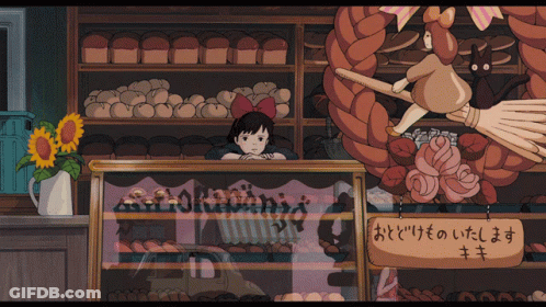 A Bakery With A Sign That Says " おどけもの いたし ます " On It GIF