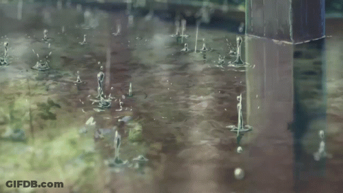 A Balcony With A View Of A Park And A Lake GIF