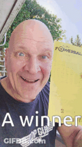 A Bald Man In A Black Shirt Is Holding Up A Powerball Ticket GIF