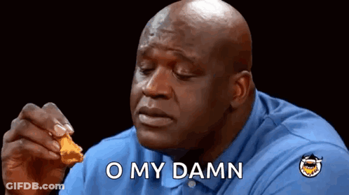 A Bald Man In A Blue Shirt Is Eating A Chicken Nugget And Saying O My Damn . GIF