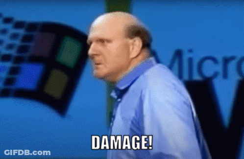A Bald Man In A Blue Shirt Says Damage In Front Of A Windows Logo GIF