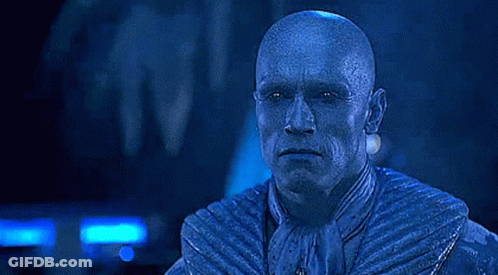 A Bald Man In A Blue Suit With The Words `` You Lie !!! '' Written On His Face . GIF