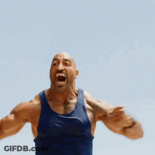 A Bald Man In A Blue Tank Top Is Screaming With His Mouth Open GIF