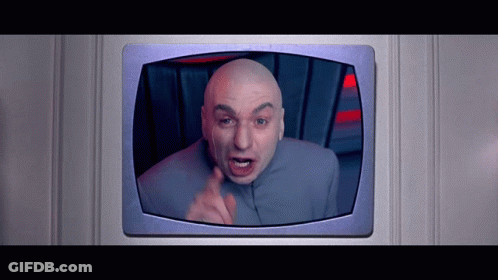 A Bald Man In A Gray Suit Is Giving The Middle Finger GIF