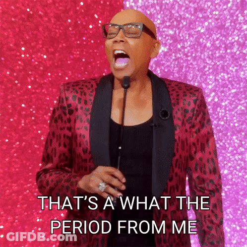A Bald Man In A Leopard Print Suit Is Speaking Into A Microphone And Saying That 'S A What The Period From Me GIF