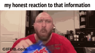 A Bald Man In A Red Shirt Is Holding A Bag Of Chips In A Kitchen . GIF