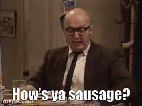 A Bald Man In A Suit And Tie Is Asking How 'S Ya Sausage ? GIF