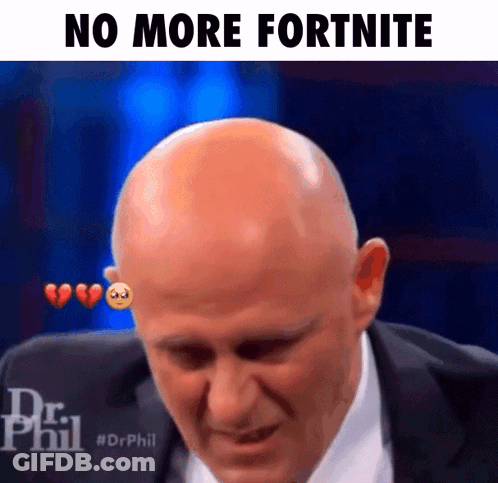 A Bald Man In A Suit And Tie Is Crying With Hearts On His Forehead . GIF
