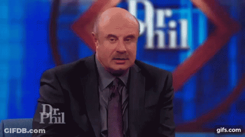 A Bald Man In A Suit And Tie Is Saying Thank You For That GIF