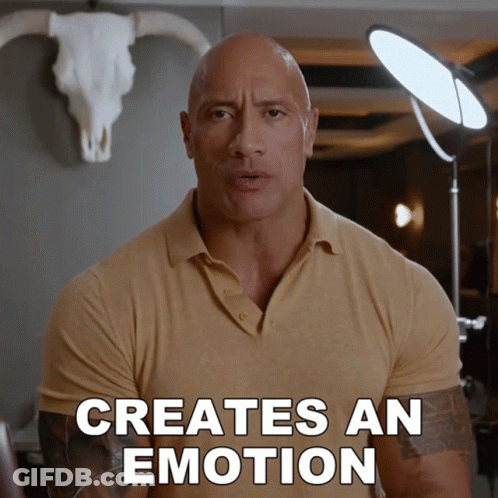 A Bald Man In A Tan Shirt Says Creates An Emotion GIF