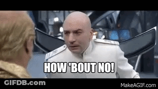 A Bald Man In A White Suit Is Talking To Another Bald Man In A Room . GIF