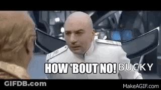 A Bald Man In A White Suit Is Talking To Another Bald Man In A Room . GIF