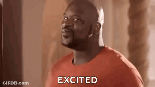 A Bald Man In An Orange Shirt Is Standing In Front Of A Punching Bag And Saying Excited . GIF