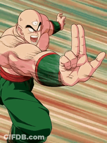 A Bald Man In Green Pants Is Making A Peace Sign With His Hand GIF