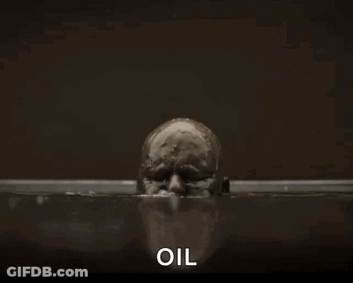 A Bald Man Is Covered In Oil And The Word Oil Is Next To Him GIF