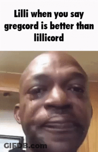 A Bald Man Is Crying While Making A Funny Face . GIF