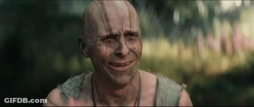 A Bald Man Is Crying With His Eyes Closed GIF