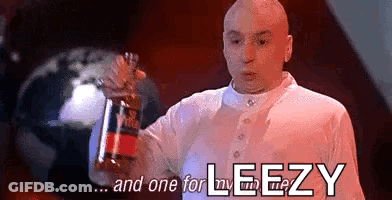 A Bald Man Is Holding A Bottle Of Coke And Says `` And One For Leezy '' . GIF