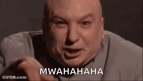 A Bald Man Is Making A Funny Face And Pointing At The Camera While Saying Mwahaha . GIF
