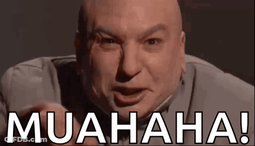 A Bald Man Is Making A Funny Face And Pointing At The Camera With The Words Muahaha Written Below Him . GIF